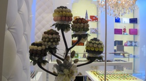 exquisite desserts in a shop window